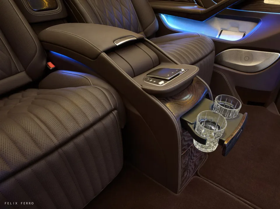 Passenger seats and an open folding table in the central console
