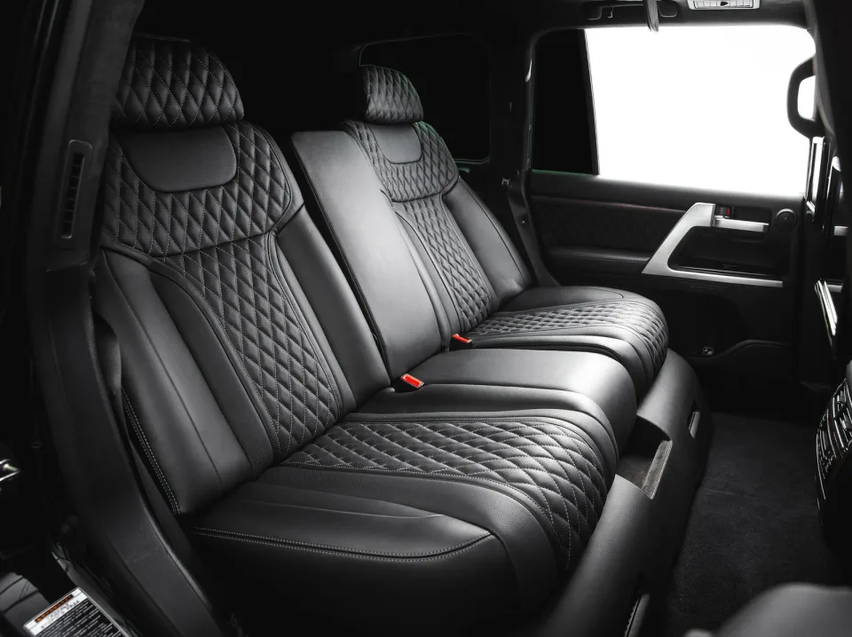 Land Cruiser rear row in black leather with diamond stitching